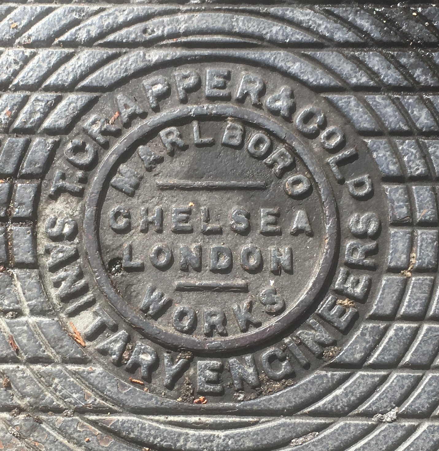 Manhole cover at former mansion, Calne, Wiltshire